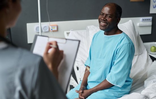patient-talking-to-nurse-during-her-visit-2023-11-27-05-14-25-utc
